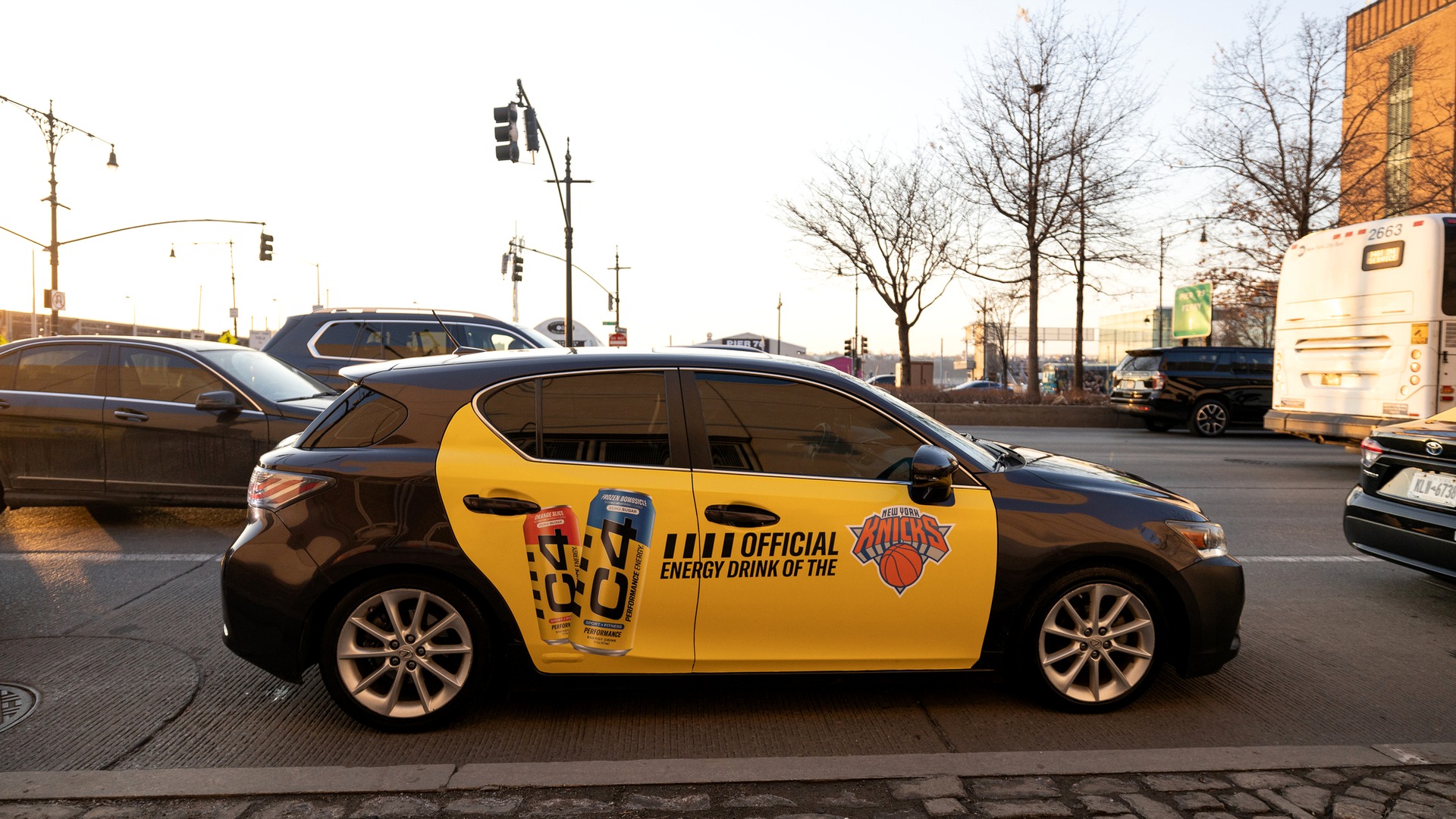 A Vugo vehicle wrap campaign at street level